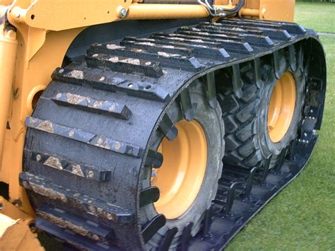 over tire tracks for skid steer loaders|skid steer tire track system.